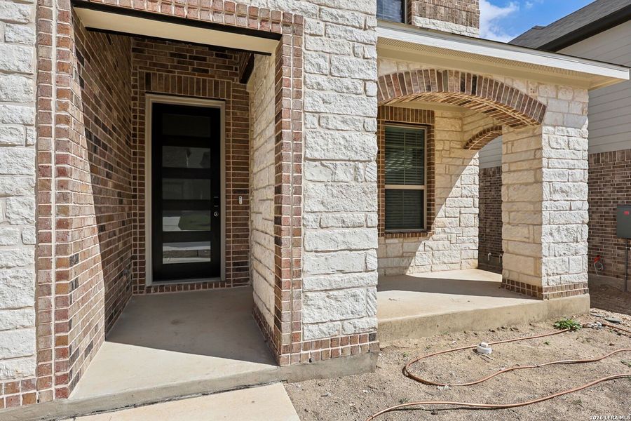 Exterior details and patio area of a home in Fox Falls, Boerne (Image 28).