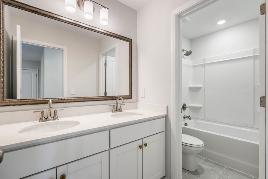Furnished interior view inside a new home in Landing at Pine Lake, Anderson (Image 14).