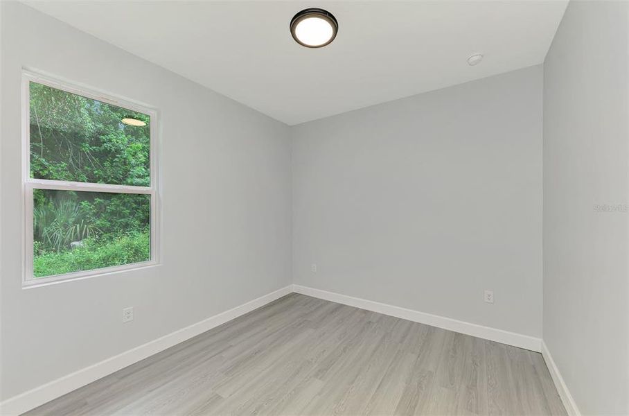 Spacious, unfurnished interior of a new home in , Port Charlotte (Image 26).