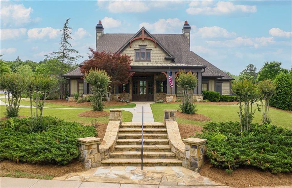 Front exterior of a new home in Sierra Creek, Hoschton, GA, highlighting curb appeal (Image 1). Front exterior of a new home in Sierra Creek, Hoschton, GA, highlighting curb appeal (Image 1).