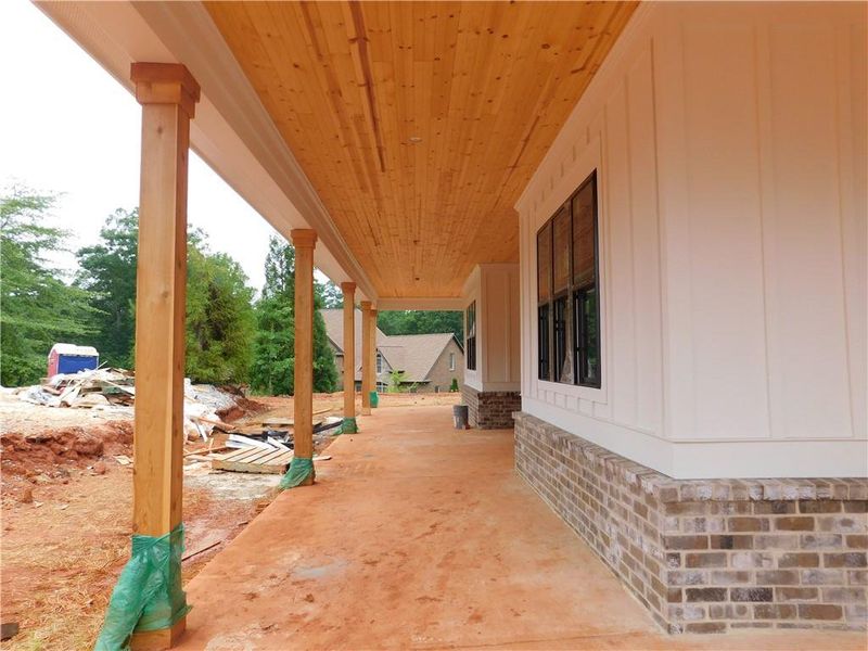 Front exterior of a new home in , Commerce, GA, highlighting curb appeal (Image 2).