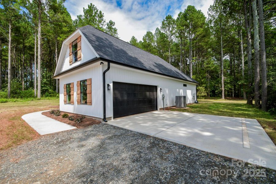 Front exterior of a new home in , Marshville, NC, highlighting curb appeal (Image 20).