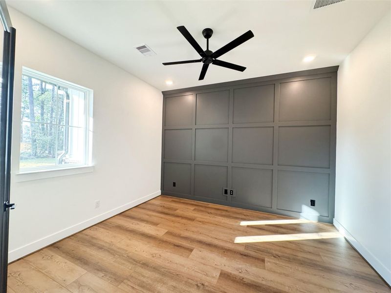 Bright Study with Designer Features Wall