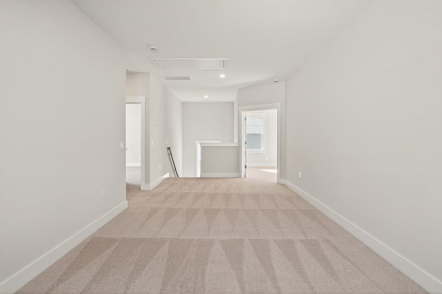 Representative unfurnished interior of a home built from the Church Hill by Hunter Quinn Homes in Huckleberry Estates, Conway (Image 33).