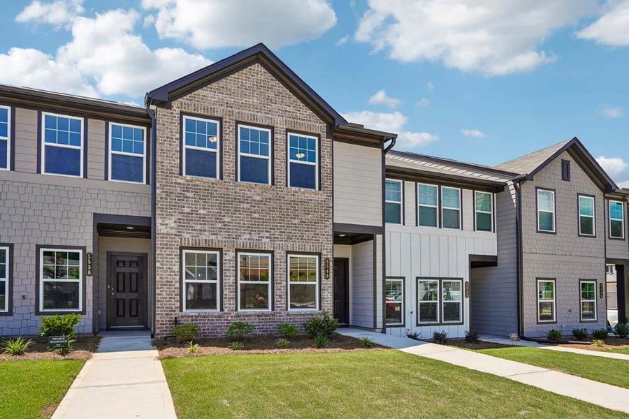 Front exterior of a new home in Laurelwood, Douglasville, GA, highlighting curb appeal (Image 1). Front exterior of a new home in Laurelwood, Douglasville, GA, highlighting curb appeal (Image 1).