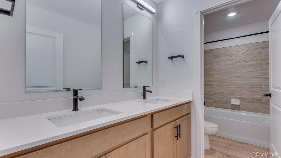 Furnished interior view inside a new home in Trails at Crowfoot, Parker (Image 11).