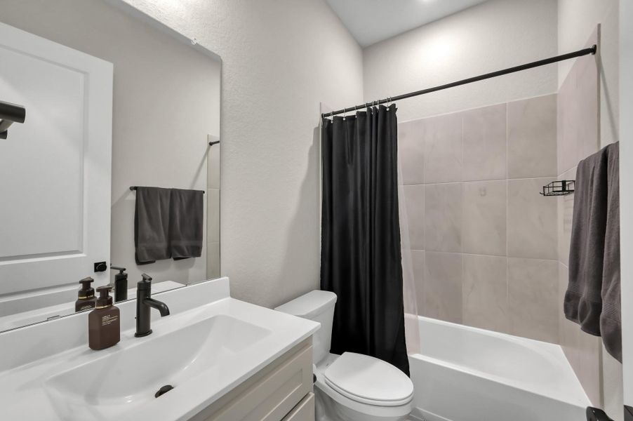 Furnished interior view inside a new home in The Woodlands Hills 60’, Willis (Image 43).