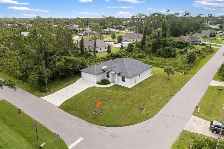Front exterior of a new home in , North Port, FL, highlighting curb appeal (Image 2).
