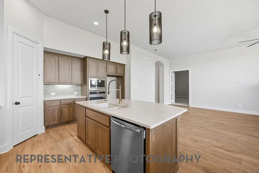 Furnished interior view inside a new home in Canyon Creek Estates, Sherman (Image 3).