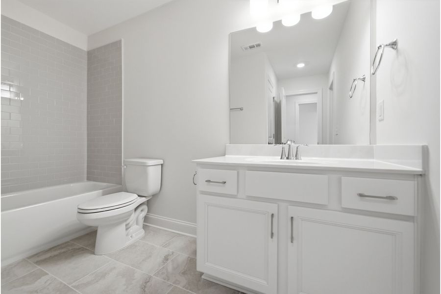 Furnished interior view inside a new home in Aden Woods, Fairview (Image 15).