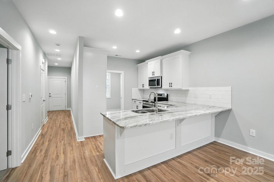 Furnished interior view inside a new home in , Hickory (Image 8).