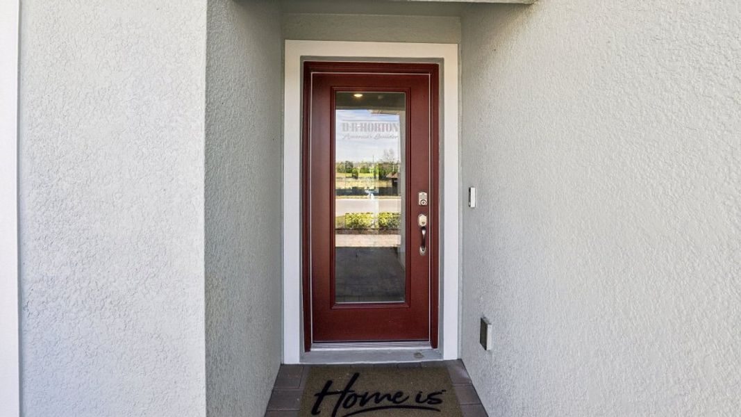 Exterior details and patio area of a home in Asher Park, Lehigh Acres (Image 20).