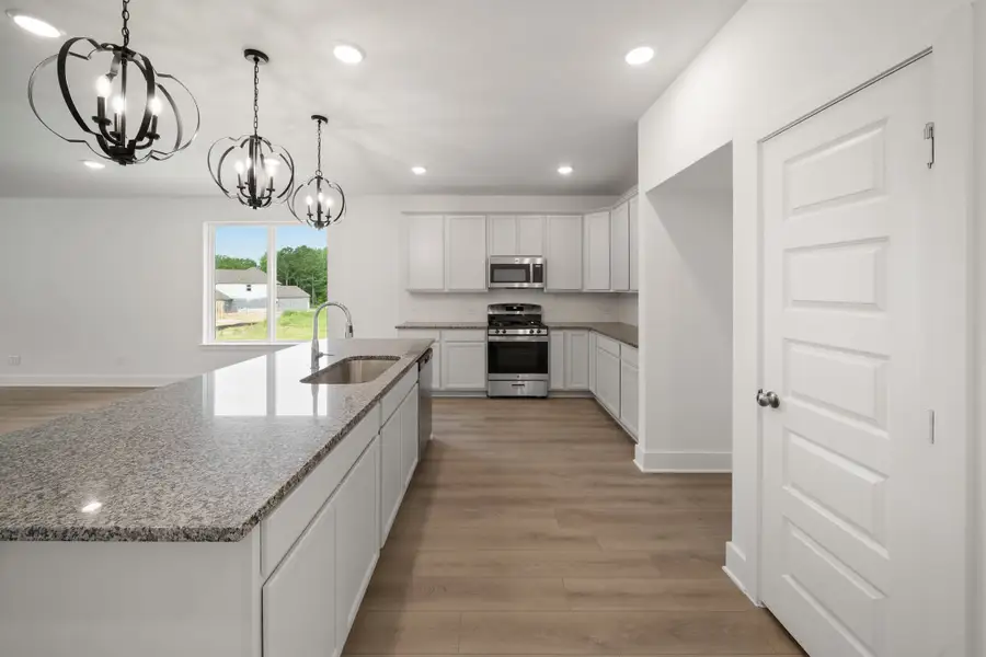 Furnished interior view inside a new home in Caddo Woods at the Brooks, Tyler (Image 3).