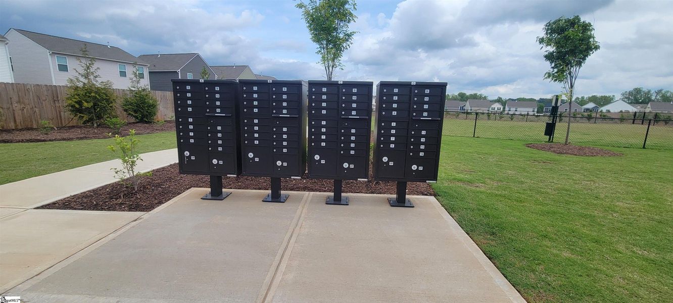 Front exterior of a new home in Hazelwood, Boiling Springs, SC, highlighting curb appeal (Image 19). Front exterior of a new home in Hazelwood, Boiling Springs, SC, highlighting curb appeal (Image 19).