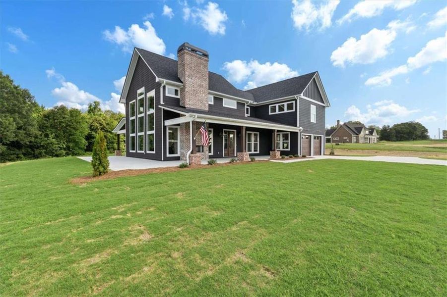 Front exterior of a new home in , Roopville, GA, highlighting curb appeal (Image 34).