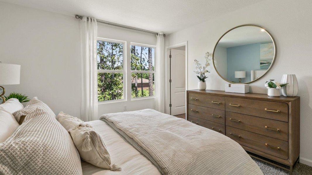 Representative furnished interior of a home built from the GREYSON by D.R. Horton in Hansen Creek, Jacksonville (Image 14).