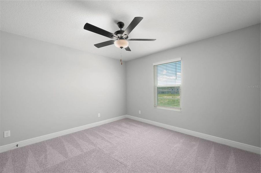 Spacious, unfurnished interior of a new home in Gum Lake Preserve, Lake Alfred (Image 24).