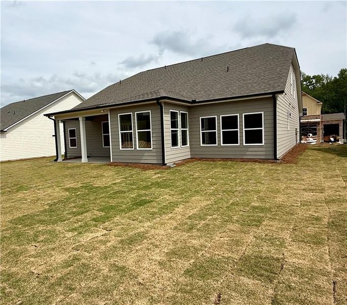 Exterior details and patio area of a home in Ponderosa Farms Reserve, Gainesville (Image 4).