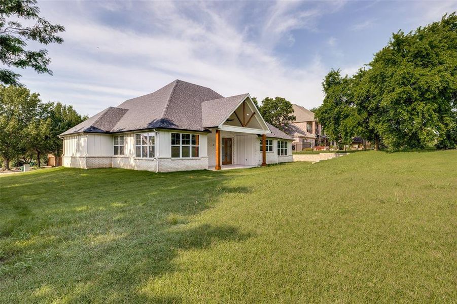 Exterior details and patio area of a home in , Pottsboro (Image 23).