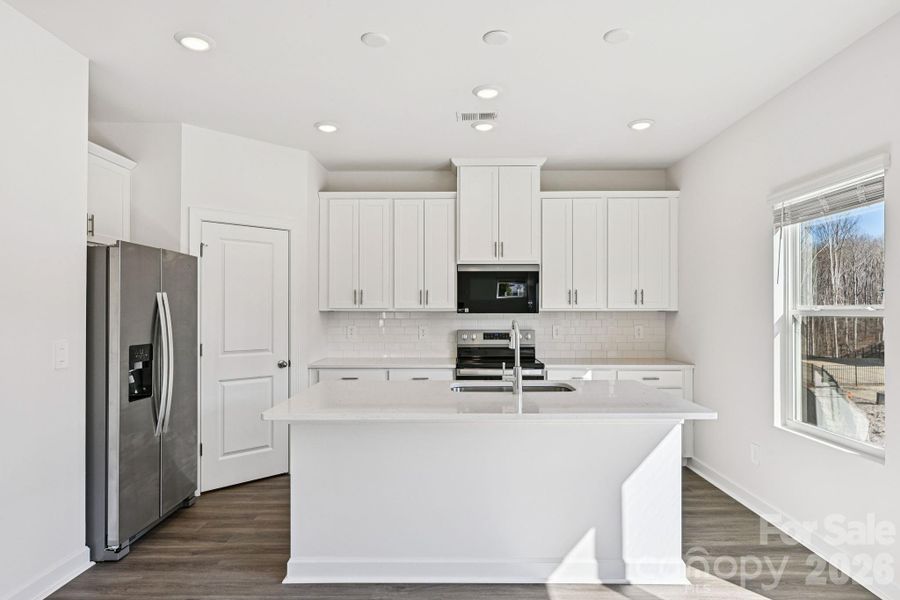 Furnished interior view inside a new home in Harper Landing, Stanley (Image 7).