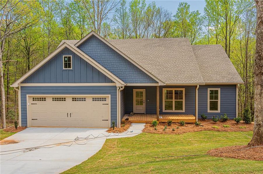 Front exterior of a new home in , Murrayville, GA, highlighting curb appeal (Image 26).