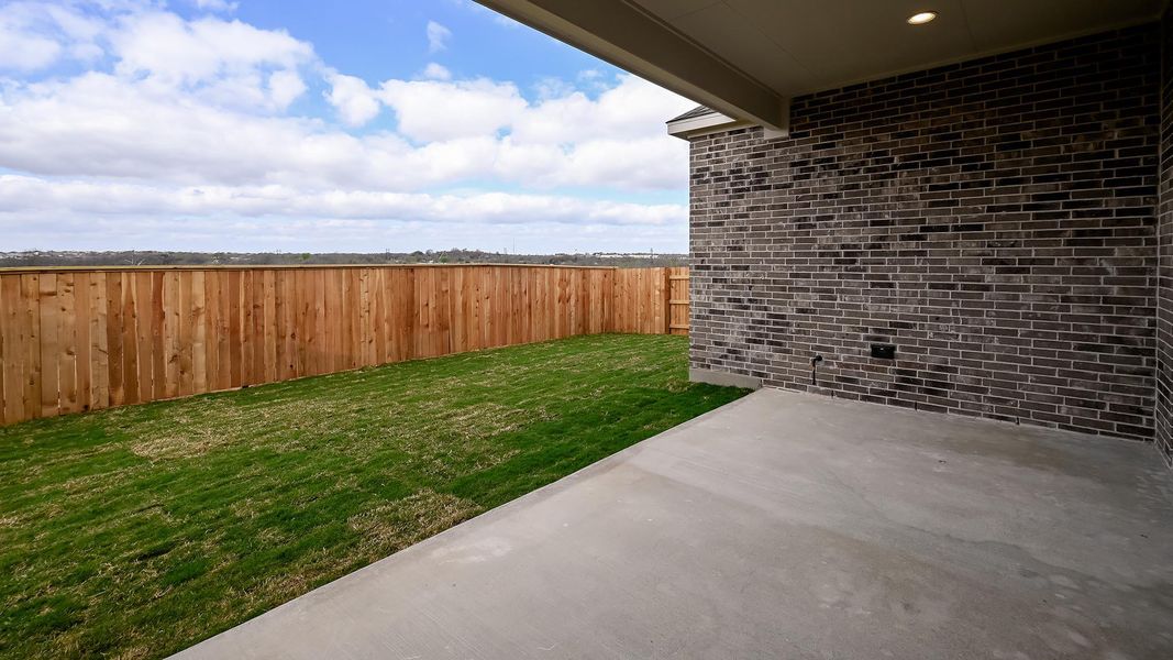 Exterior details and patio area of a home in Crosswinds, Kyle (Image 3).