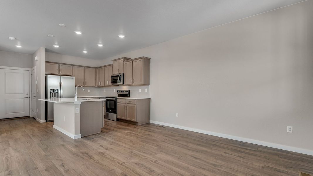 Furnished interior view inside a new home in Horizon Uptown, Aurora (Image 7).