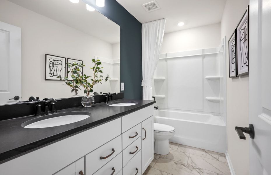 Furnished interior view inside a new home in Stewarts Landing, Charlotte (Image 15).