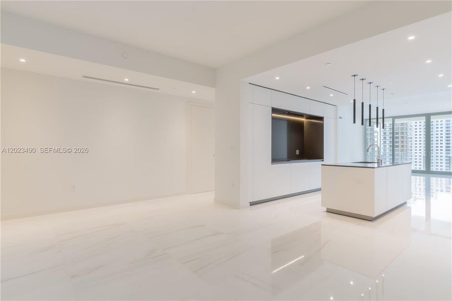 Spacious, unfurnished interior of a new home in Aston Martin Residences, Miami (Image 32).