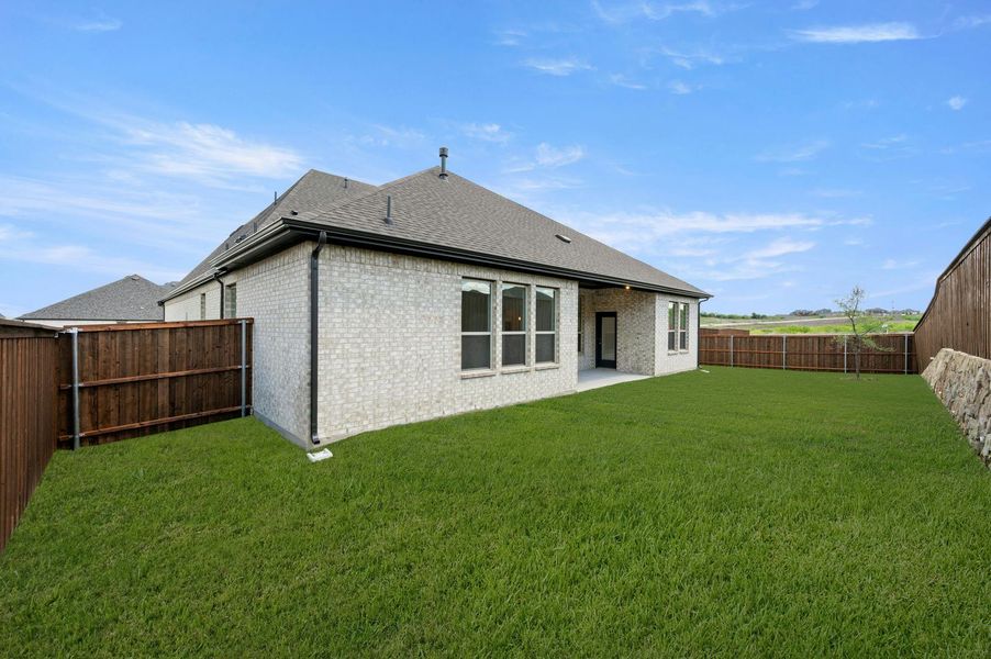 Exterior details and patio area of a home in Westside Preserve, Midlothian (Image 24).