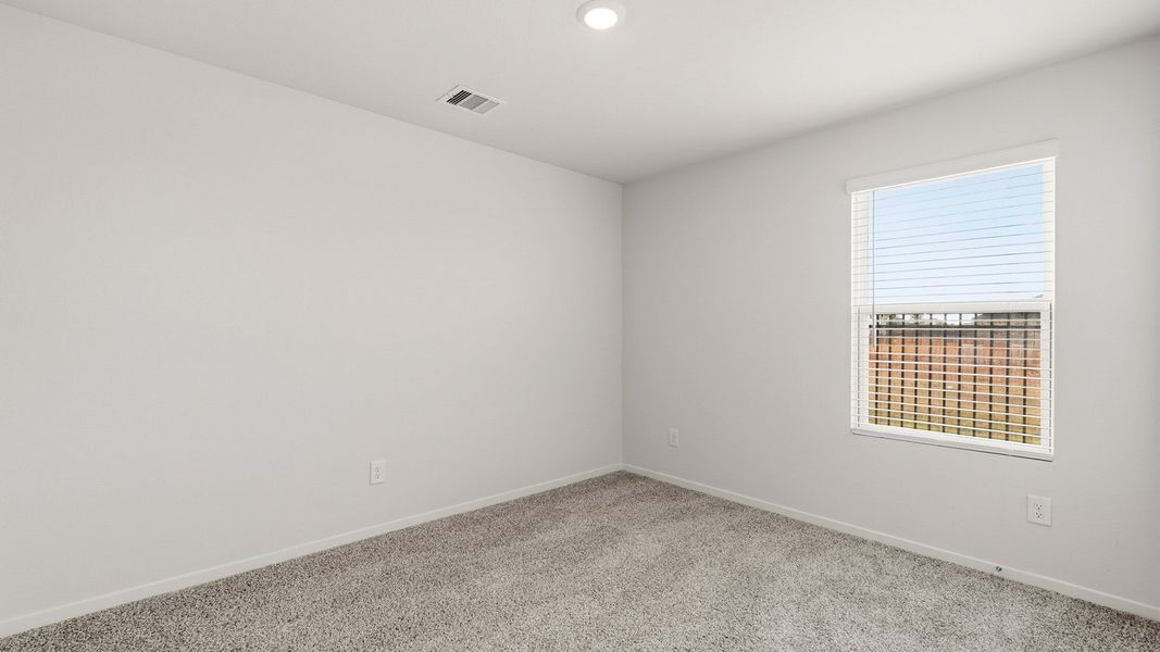 Spacious, unfurnished interior of a new home in Sunterra, Katy (Image 20).