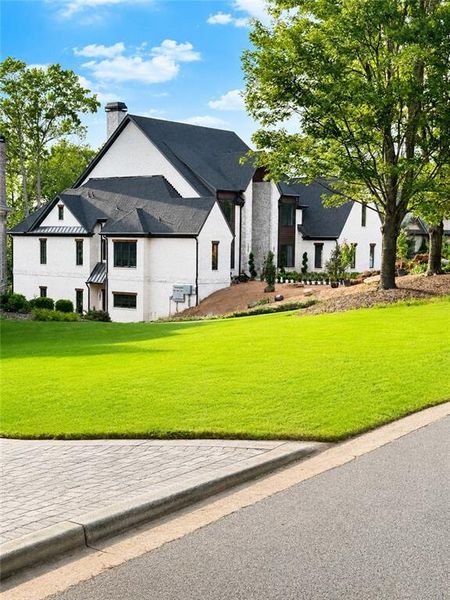 Front exterior of a new home in , Alpharetta, GA, highlighting curb appeal (Image 29).
