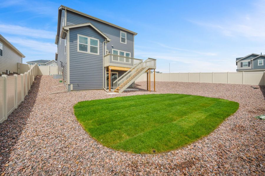 Front exterior of a new home in Trails at Aspen Ridge-3, Colorado Springs, CO, highlighting curb appeal (Image 22).