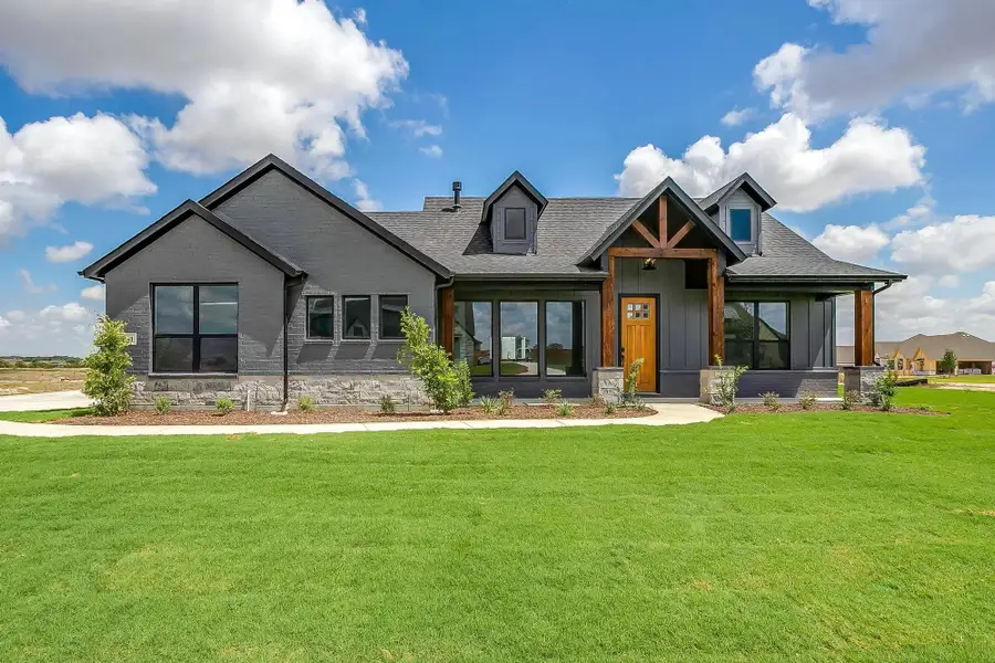 Front exterior of a home in the Matthews Farm community, located in Venus, TX (Image 7). Front exterior of a home in the Matthews Farm community, located in Venus, TX (Image 7).