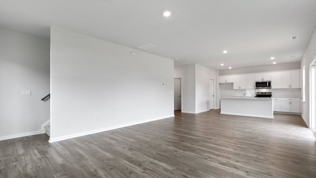 Spacious, unfurnished interior of a new home in Villa Grande, Winterville (Image 23).