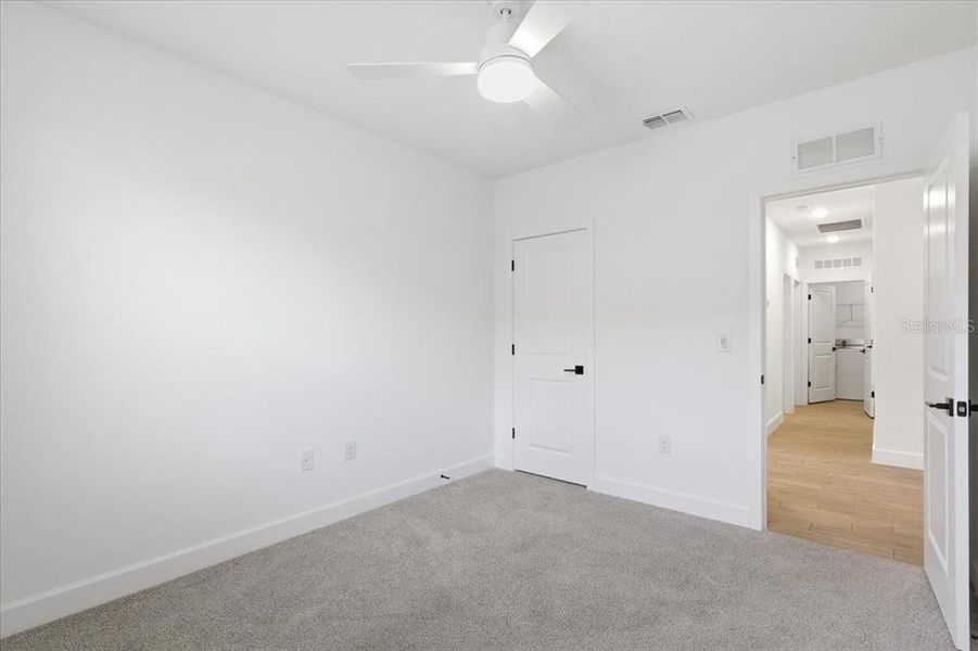 Spacious, unfurnished interior of a new home in Aspire at Palm Coast, Palm Coast (Image 23).