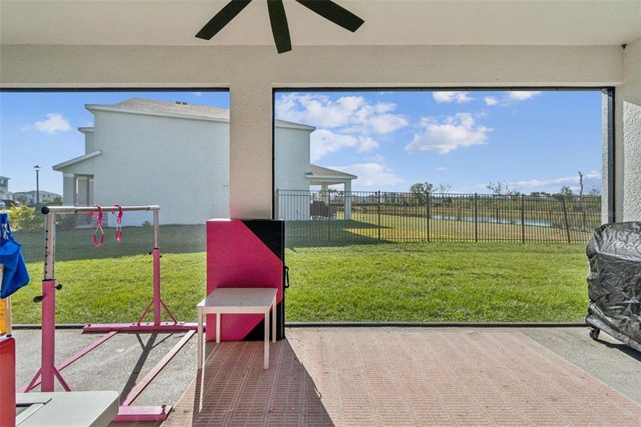 Exterior details and patio area of a home in Bella Lago, Parrish (Image 28).
