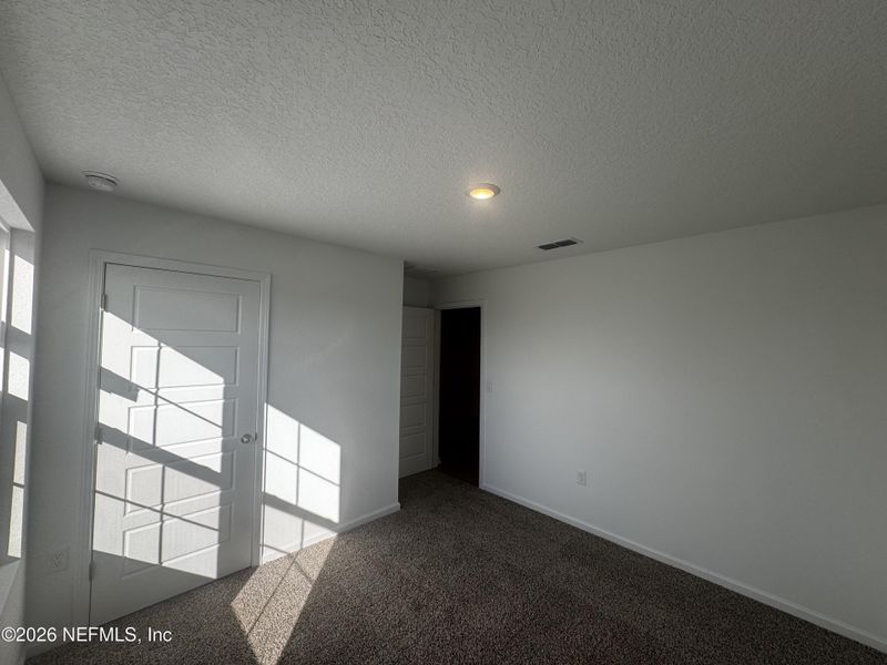 Spacious, unfurnished interior of a new home in The Arbors, Jacksonville (Image 45).