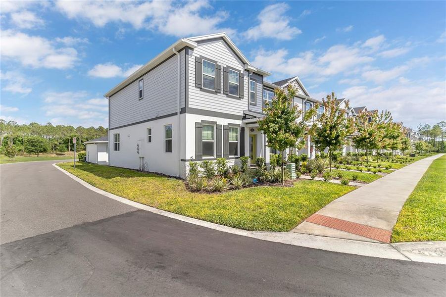 Front exterior of a new home in , Winter Garden, FL, highlighting curb appeal (Image 23).