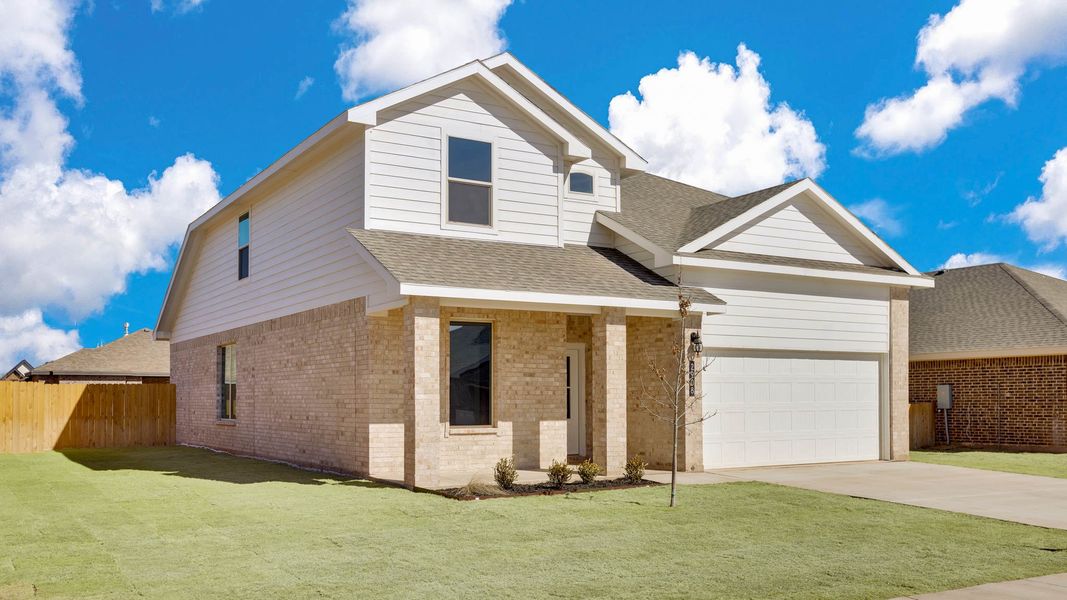 Front exterior of a new home in Viridian, Lubbock, TX, highlighting curb appeal (Image 2).