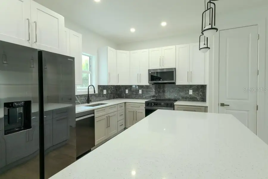 Furnished interior view inside a new home in , North Port (Image 4).