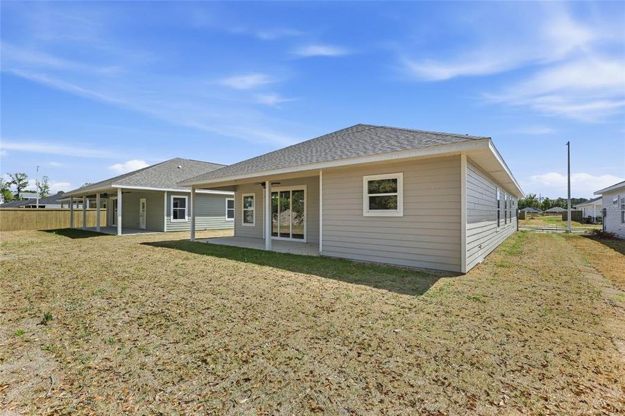 Exterior details and patio area of a home in Grand Oaks, Gainesville (Image 3).