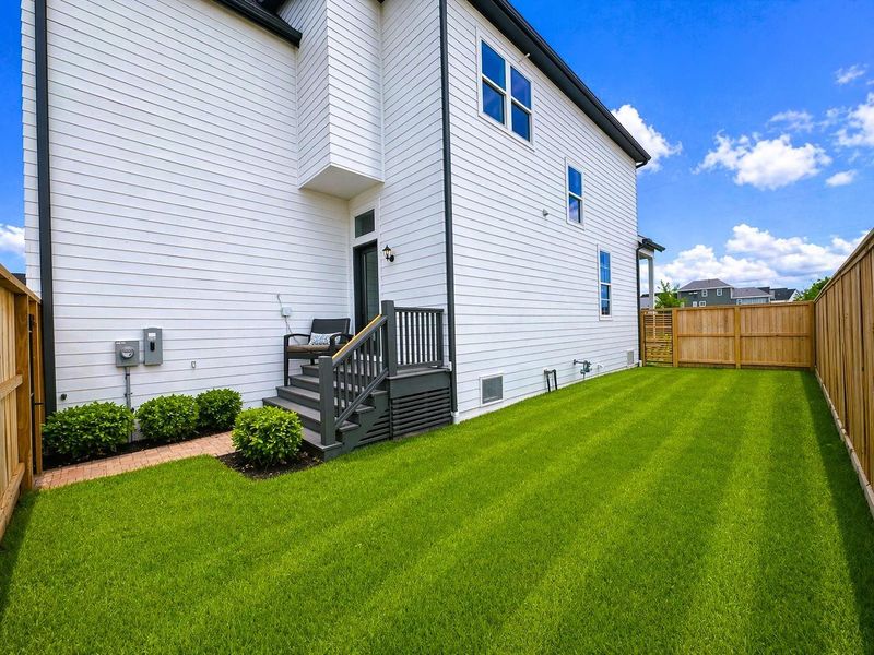 Large fenced-in yard, off back patio (pic was virtually enhanced)