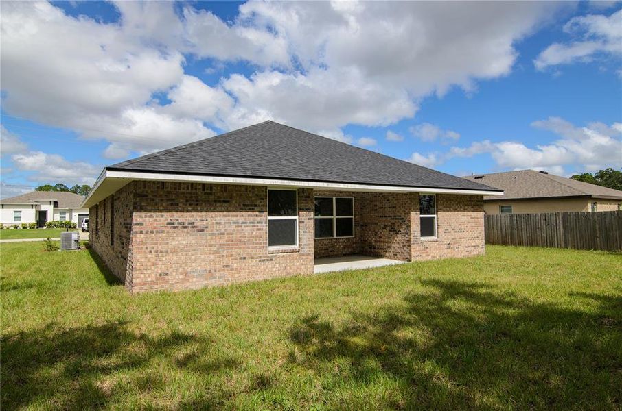 Exterior details and patio area of a home in Palm Coast, Palm Coast (Image 4).