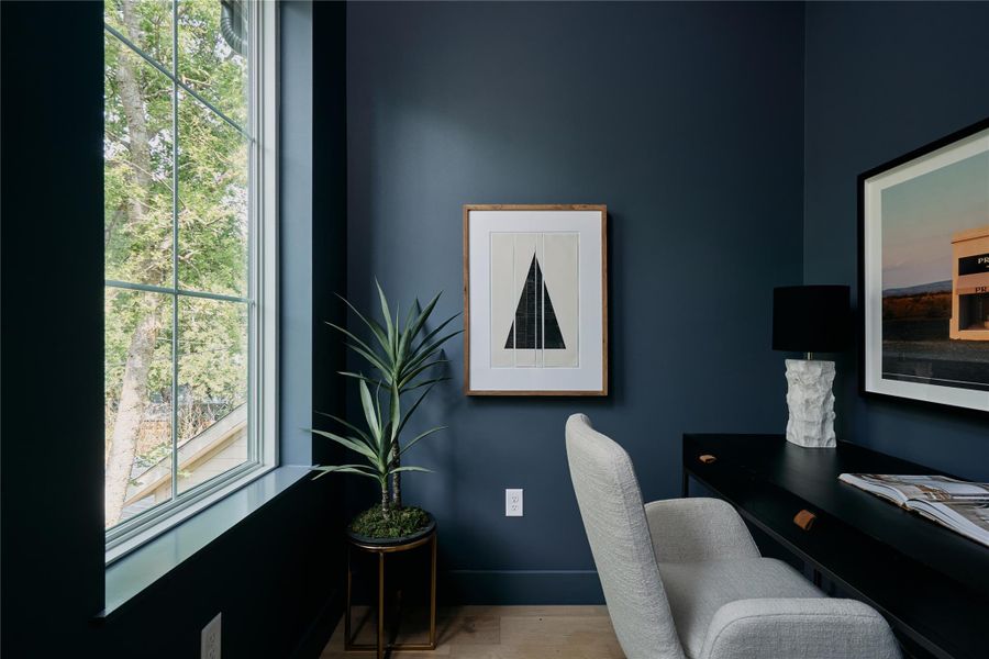 Office area with wood finished floors Office area with wood finished floors