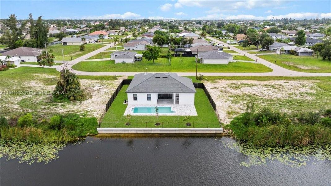 Front exterior of a new home in , Cape Coral, FL, highlighting curb appeal (Image 25). Front exterior of a new home in , Cape Coral, FL, highlighting curb appeal (Image 25).