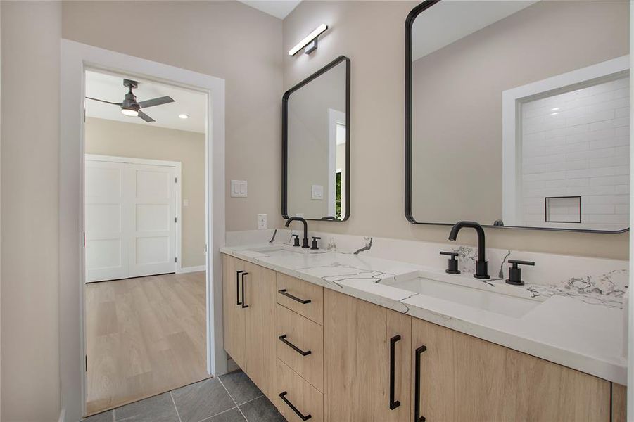 Bathroom with vanity and hardwood / wood-style floors