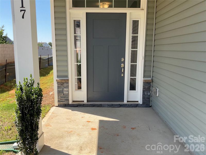 Exterior details and patio area of a home in Village at Parkside, Gastonia (Image 16).