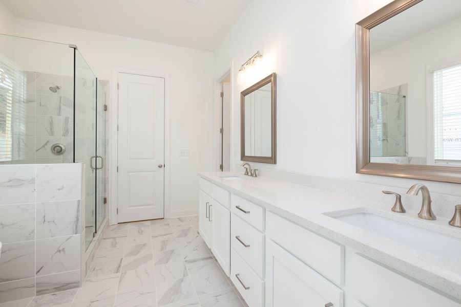 Master bathroom with dual vanities