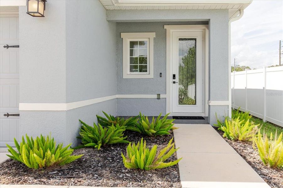 Front exterior of a new home in Conner Crossing, Spring Hill, FL, highlighting curb appeal (Image 26).
